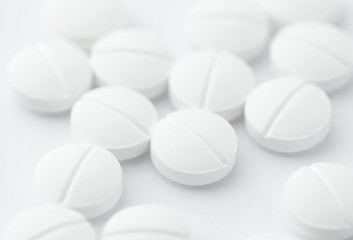 Image showing White pills on white