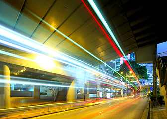 Image showing light trails in city at night