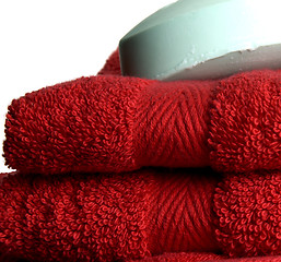 Image showing red towels and soap