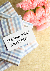 Image showing Gift and pink carnations flower for Mother's Day