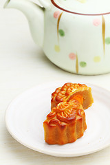 Image showing Mooncake with teapot