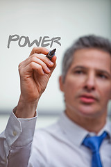 Image showing Businessman writing with a felt tip pen