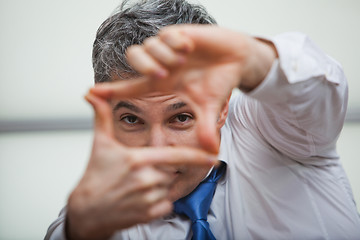 Image showing Businessman making a finger frame