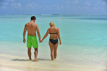 Image showing happy young  couple at summer vacation have fun and relax at bea