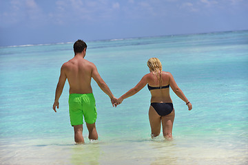 Image showing happy young  couple at summer vacation have fun and relax at bea