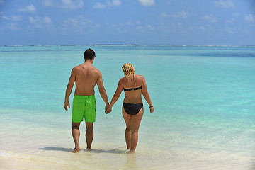 Image showing happy young  couple at summer vacation have fun and relax at bea