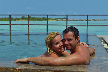 Image showing happy young  couple at summer vacation have fun and relax at bea