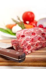 Image showing chopping fresh pork ribs and vegetables