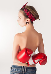 Image showing beautiful topless woman with boxing gloves