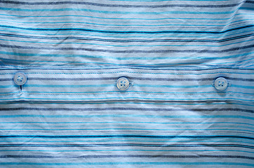 Image showing shirt blue fabric lines simple buttons background 