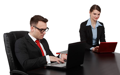 Image showing Young Business Couple on Laptops