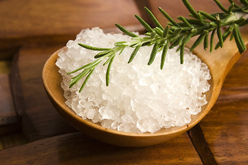 Image showing sea salt with rosemary on a wooden spoon