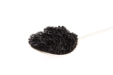 Image showing black caviar in spoon on white background
