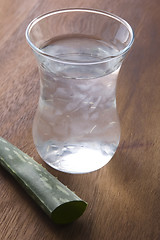 Image showing aloe vera juice with fresh leaves