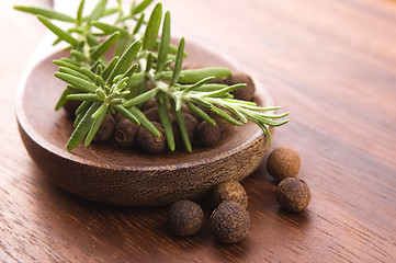 Image showing allspice with fresh rosemary