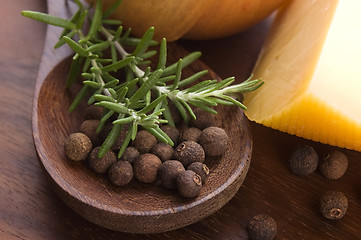Image showing allspice with fresh rosemary, cheese and onion