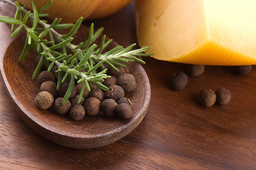 Image showing allspice with fresh rosemary, cheese and onion