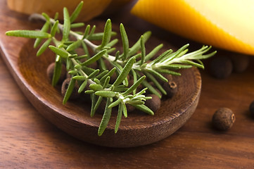 Image showing allspice with fresh rosemary, cheese and onion