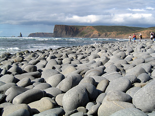 Image showing Walking the shore