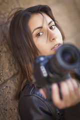 Image showing Mixed Race Young Adult Female Photographer Holding Camera