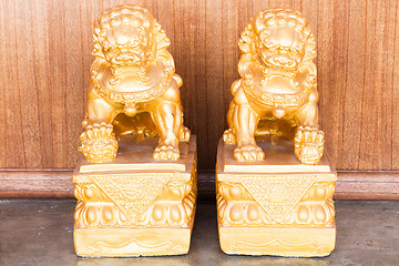 Image showing Chinese style figurine couple golden singha