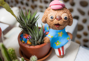 Image showing Paint doll clay ornamental potted plants on table