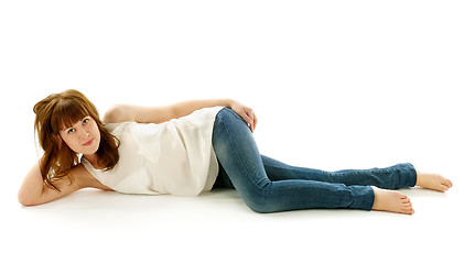 Image showing Young Woman in Jeans and Barefoot