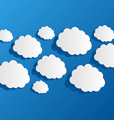 Image showing Set cut out clouds, blue paper