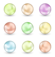 Image showing Group of colorful pearls isolated on white background