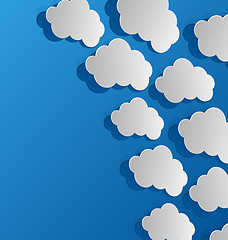 Image showing Set cut out clouds, blue paper