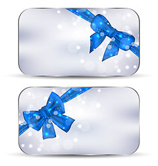 Image showing Set labels with blue gift bows isolated