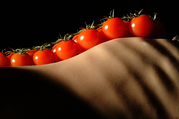 Image showing  tomatoes on torso