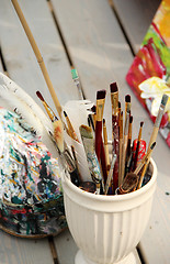 Image showing Vivid paintbrushes at the atelier 