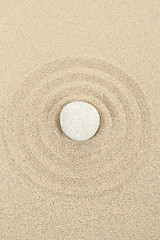 Image showing zen stone in sand with circles