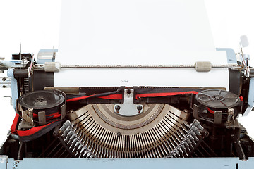 Image showing retro typewriter close up with entered paper