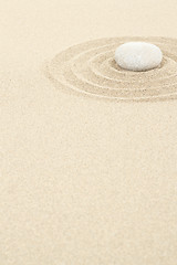 Image showing zen stone in sand with circles