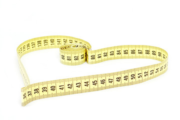 Image showing Tape measure heart shape - health, weight concept 