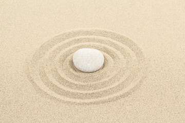 Image showing zen stone in sand with circles