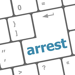 Image showing arrest word on computer pc keyboard key