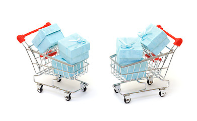 Image showing Cyan gift boxes in shopping carts