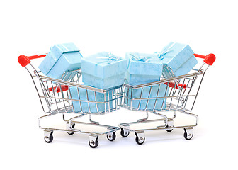 Image showing Cyan gift boxes in shopping carts