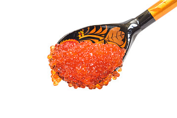 Image showing Red salted caviar with wooden spoon