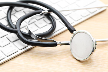 Image showing stethoscope on keyboard