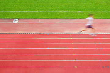 Image showing Runner in race track 