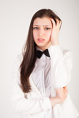 Image showing businesswoman with a headache