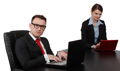 Image showing Young Business Couple on Laptops