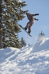 Image showing Jump of man snowboarder