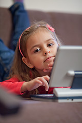 Image showing Girl using a laptop for children