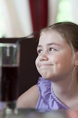 Image showing Little girl in cafe