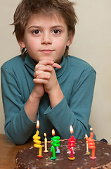 Image showing Cute boy at birthday cake